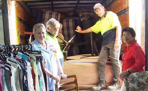 Unloading fresh stock in preparation for the St Vinnies open day are volunteers Joan Hutchins (left) and Mila Diaz and delivery drivers Noel and Norm. Unloading fresh stock in preparation for the St Vinnies open day are volunteers Joan Hutchins (left) and Mila Diaz and delivery drivers Noel and Norm.
